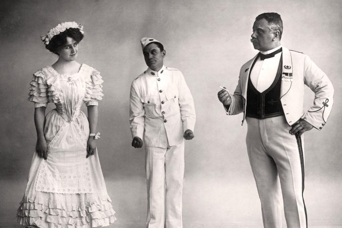 three people standing