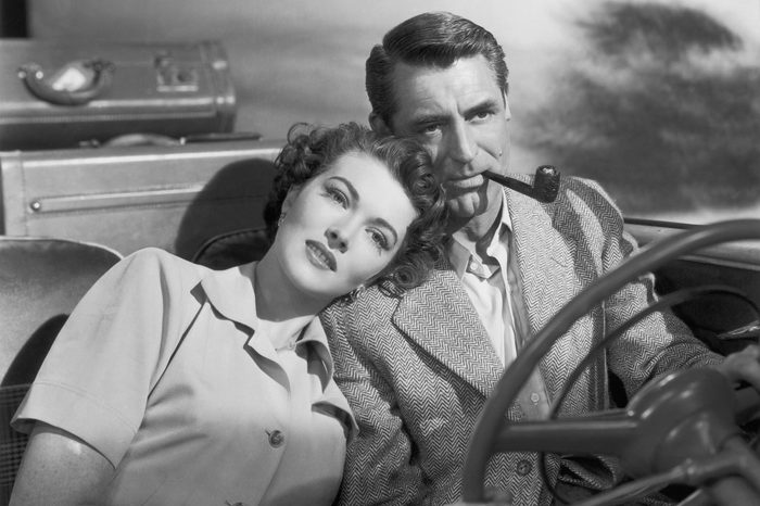 American actors Paula Raymond and Cary Grant on the set of the 1950 film "Crisis", directed by Richard Brooks