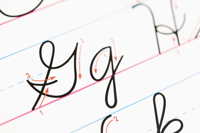 Close up of cursive handwriting practice page.
