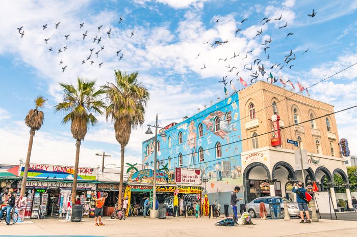 VENICE, UNITED STATES - DECEMBER 18, 2013: big mural in the Ocean Front Walk in Venice Beach, by the artist Rip Cronk who painted some of the most famous murals along the boardwalk and neighborhoods.
