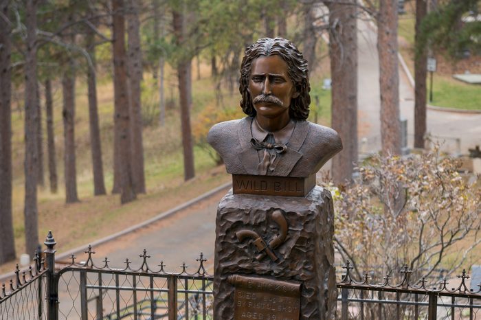 DEADWOOD, SOUTH DAKOTA - NOVEMBER 1: Grave site of Wild Bill Hickok at the Mount Moriah Cemetery on November 1, 2015 in Deadwood, South Dakota