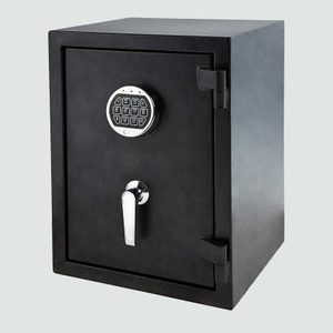A black safe stands with a closed electronic keypad lock, situated in a plain environment.