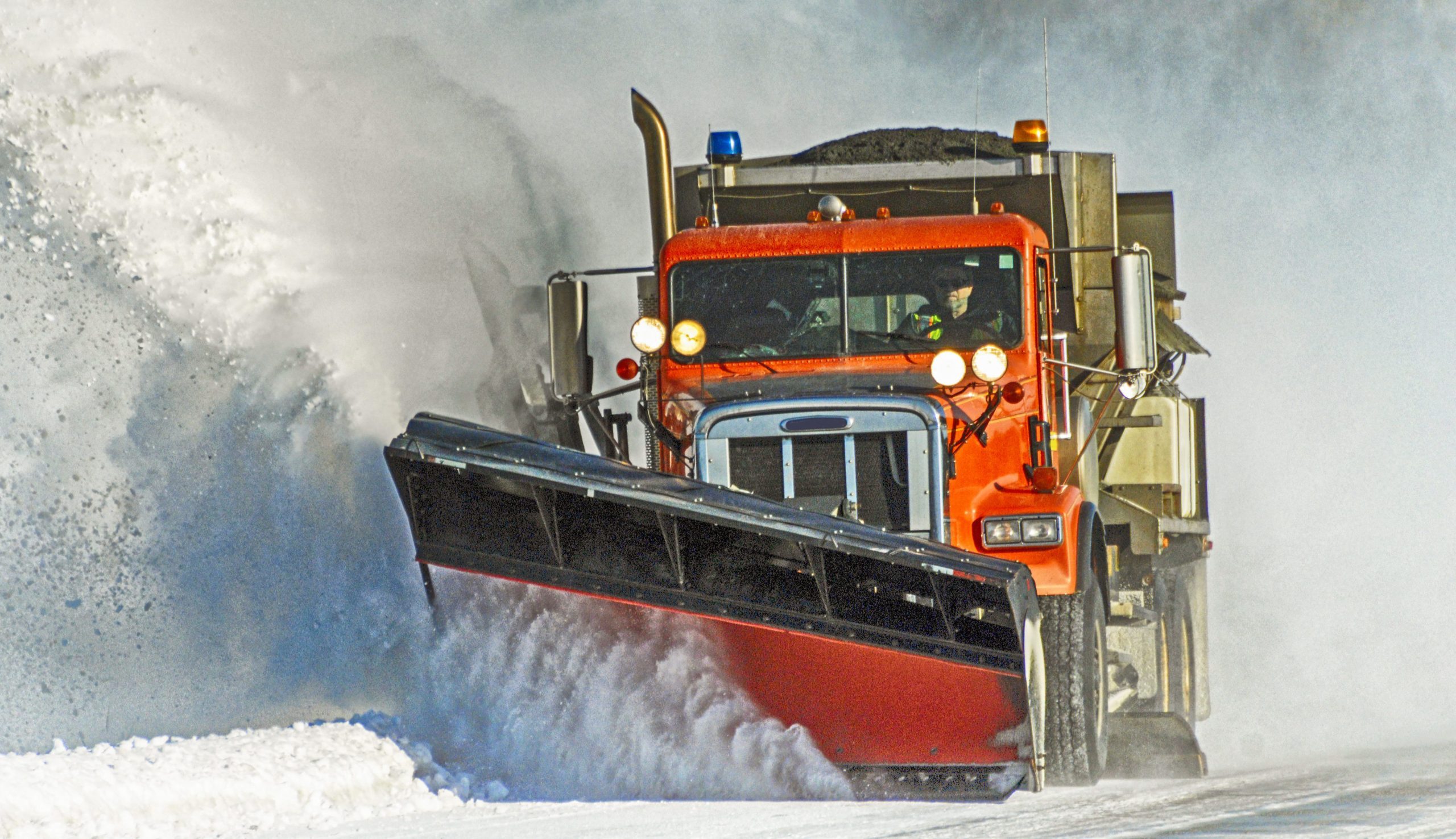 Here’s Exactly What to Do When You Spot a Snow Plow on the Road