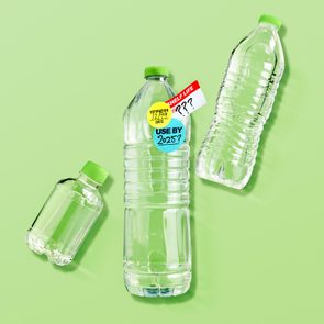 Empty plastic bottles lie scattered; labels question expiration years 