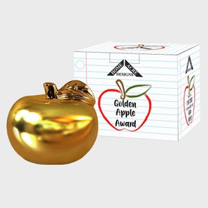 Golden apple sits beside a decorative box labeled 