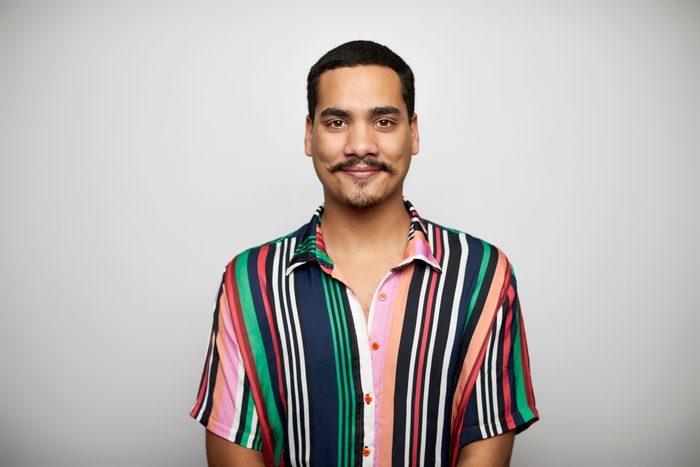 Confident male against white background