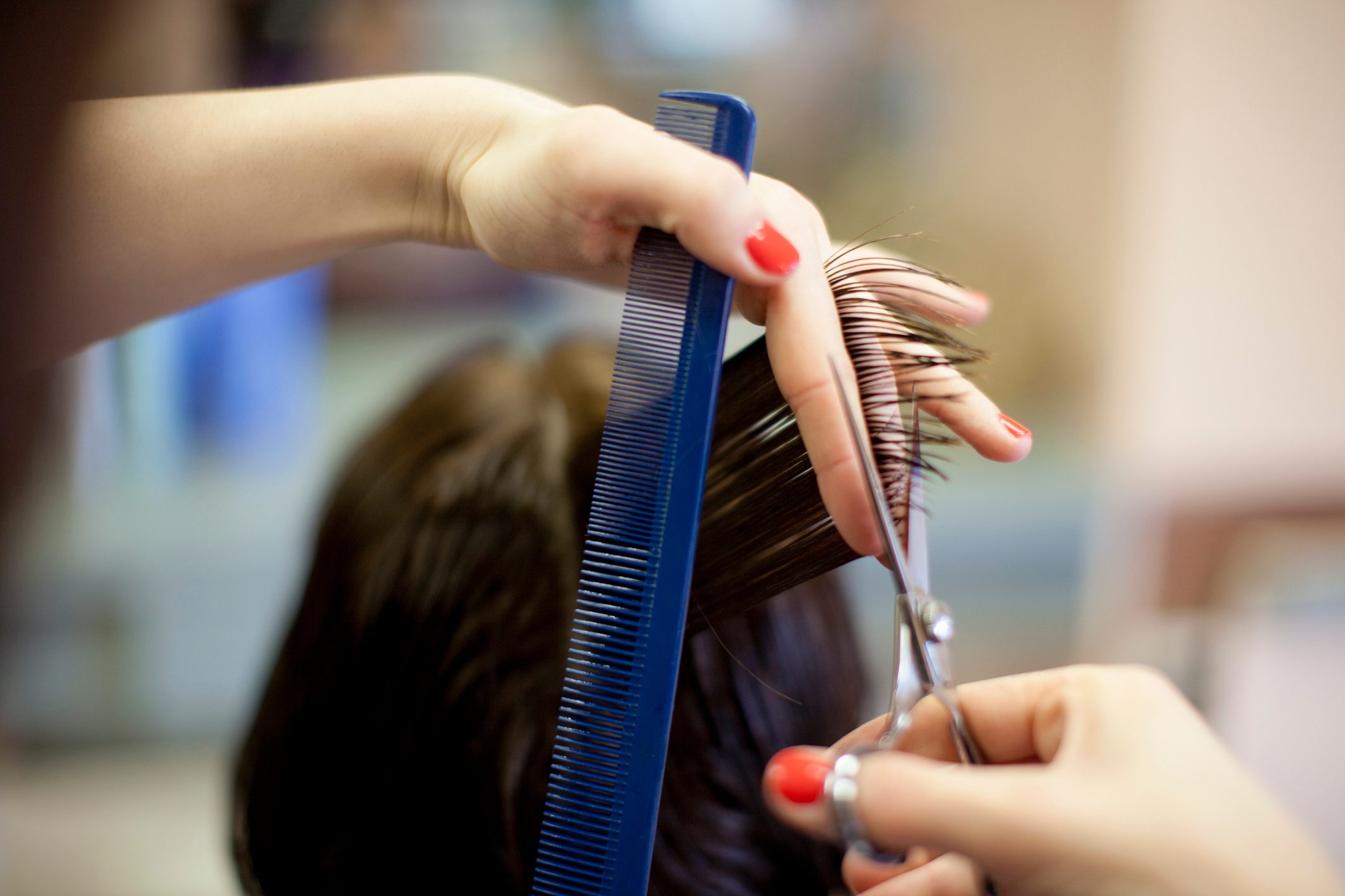 Woman 40s at hairdresser