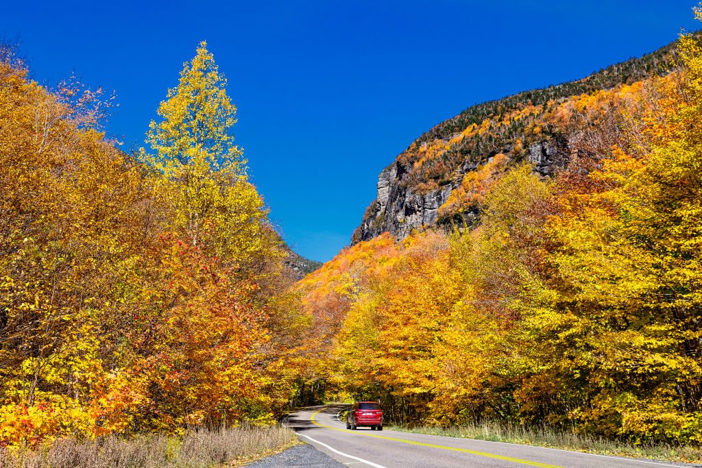 Scenic autumn drive through Smugglers Notch State Park