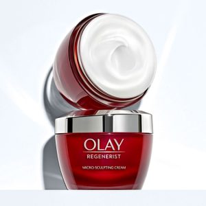Red jar displays open cream, revealing a smooth swirl, labeled 