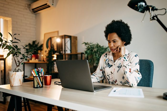 Hispanic business woman working from home