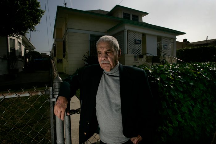 (Los Angeles)World War ll hero Guy Gabaldon stands in front of the house in Boyle Heights where he
