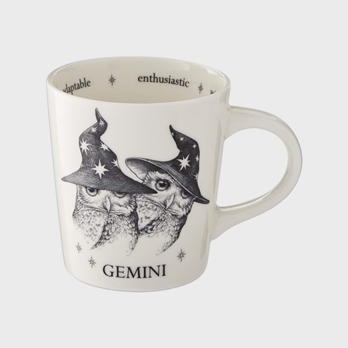 Mug displays two owls in starry wizard hats; labeled 