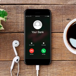 Smartphone displaying incoming call from 