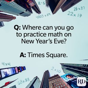 Skyscrapers extend upward; math joke text overlaid. 