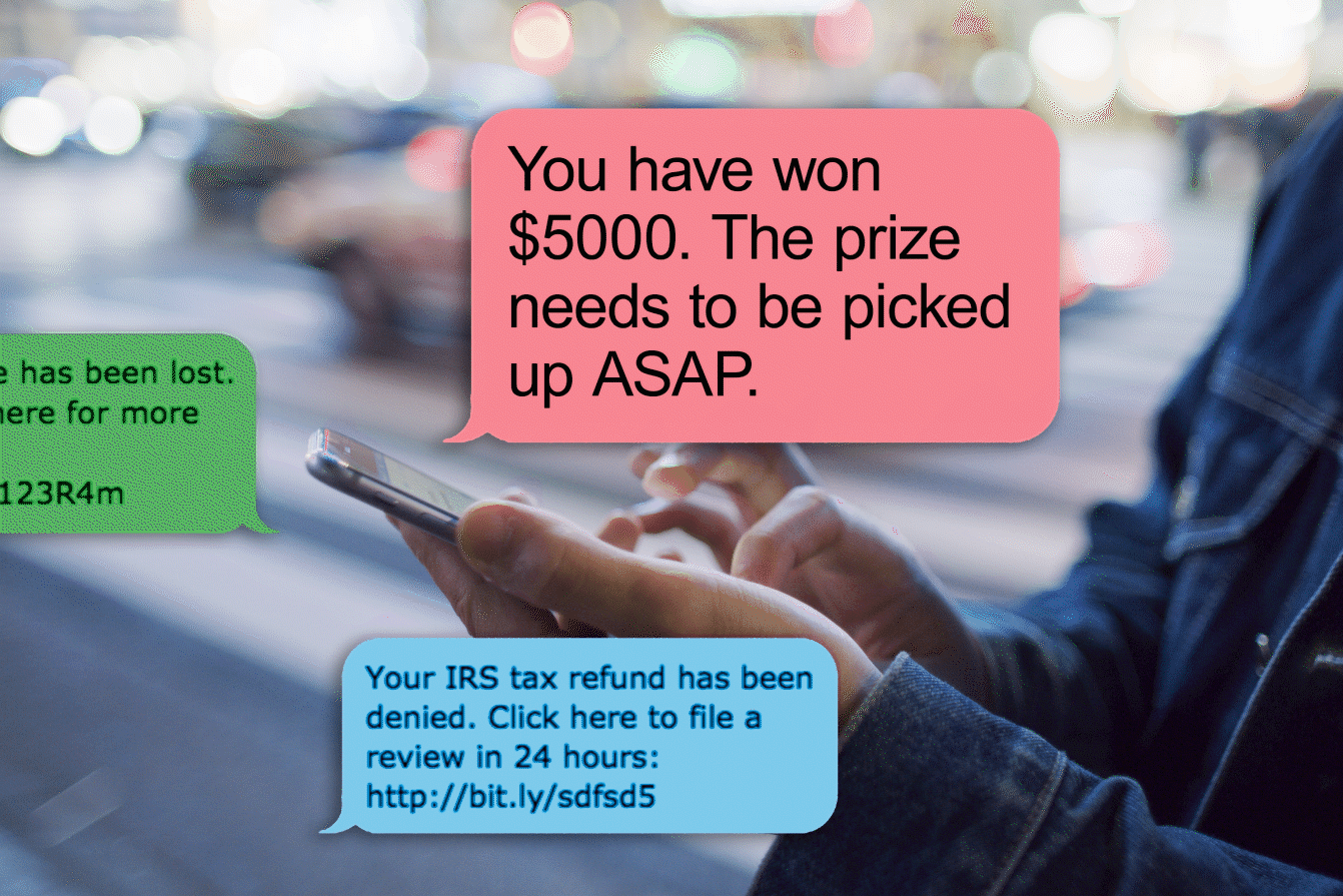Hand holds smartphone displaying fraudulent messages; background shows a blurred street with city lights. Text includes spam about winning money and IRS scams.