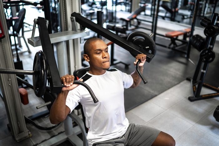 man exercising at the gym