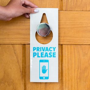 Door hanger reads 