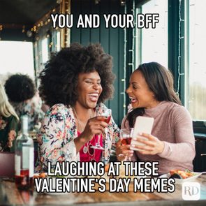 Two friends laugh joyfully, holding glasses in a decorated, lively cafe. Text reads, 