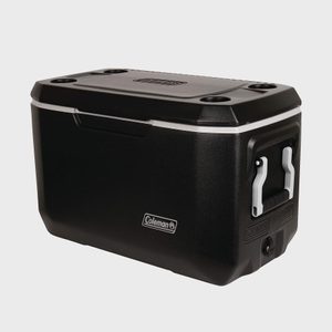 A black cooler, closed, sits on a plain white background. It features handles and the brand name 