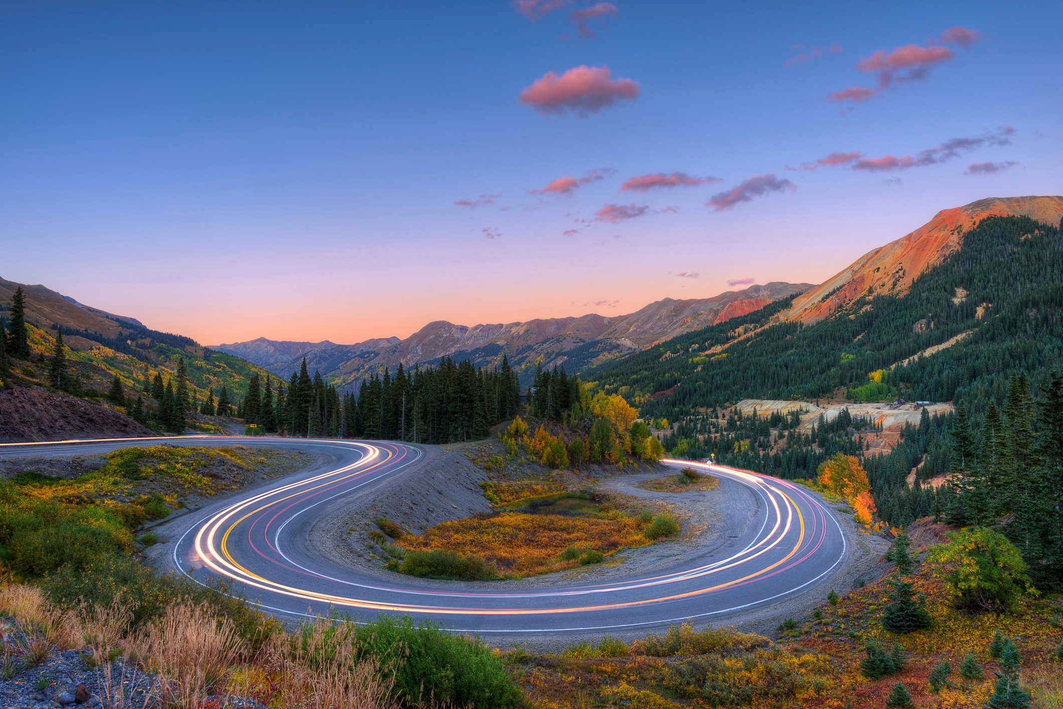 Light Trails on a switchback turn at sunset on the Million Dollar Highway, Colorado