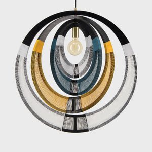 Circular pendant light features concentric, colorful rings surrounding a central bulb, set against a plain background.
