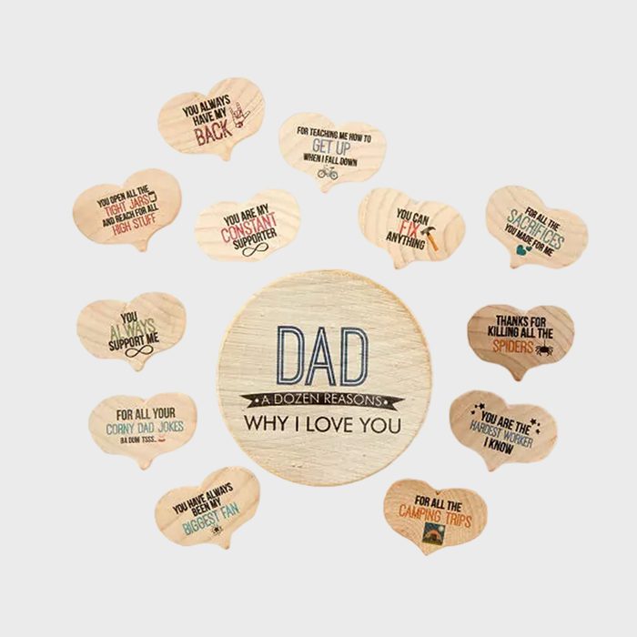 Wooden message plaques express gratitude to a dad, highlighting various supportive actions in a circular arrangement around a central disc.