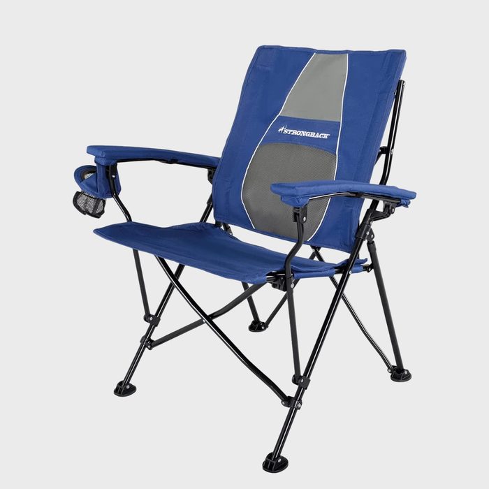 Folding chair stands open, featuring a blue fabric with 