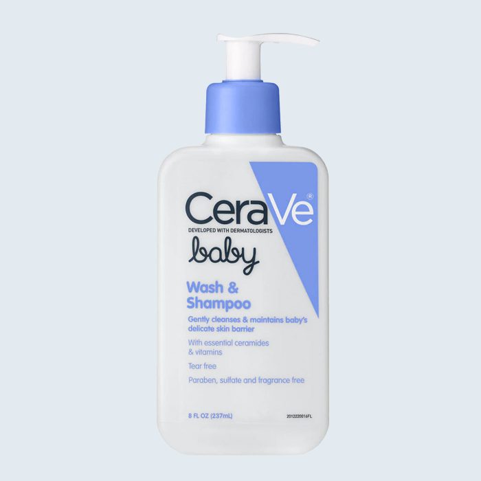 Bottle dispenses baby wash and shampoo, labeled with â€œCeraVe baby,â€ features blue pump, essential ceramides for delicate skin, and tear-free formula against a light background.