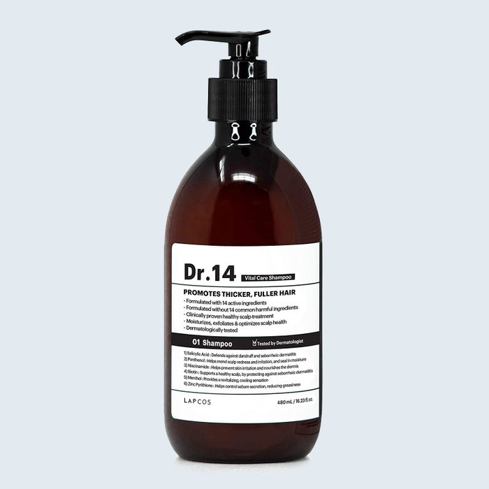 Bottle dispenses shampoo; promotes thicker, fuller hair; brown with black pump; features label 