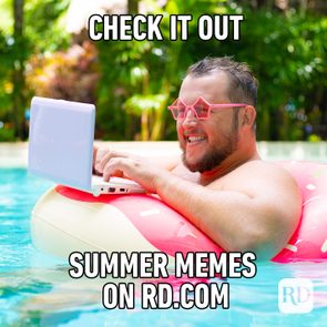 Person using a laptop while lounging on a pink float in a pool; wearing novelty glasses. Text reads: 