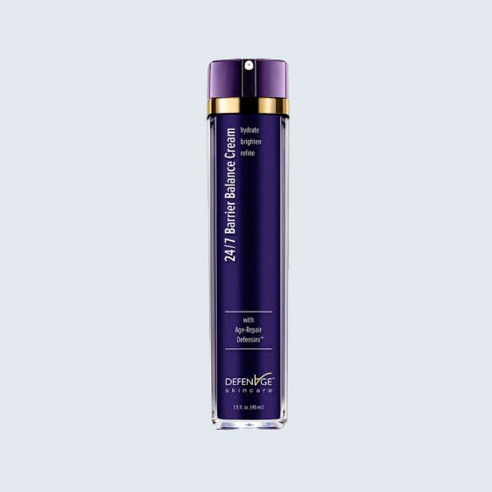 A tall, purple bottle displays 