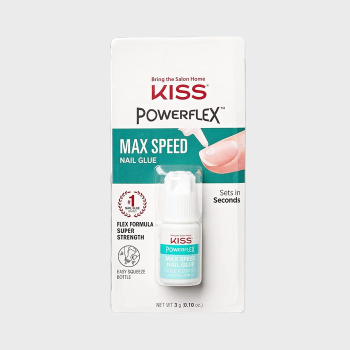 Nail glue bottle displayed in packaging, promoting 