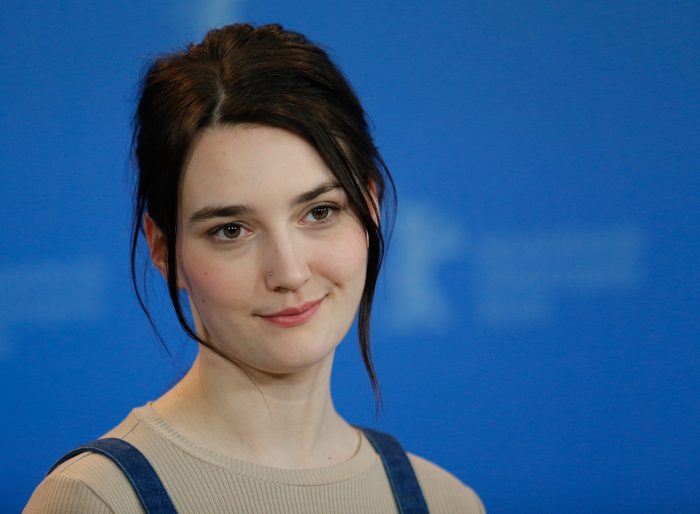 heart shaped face with a slight side part