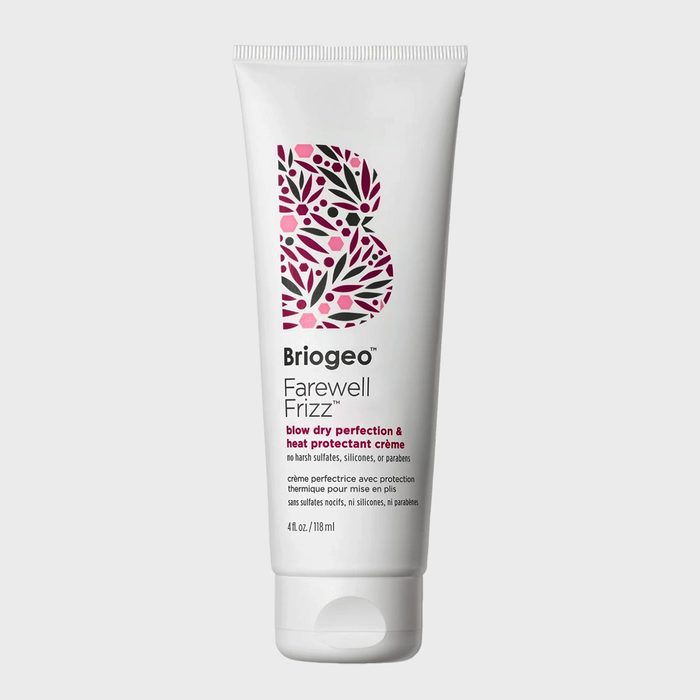 Tube with floral design stands upright; it's labeled 