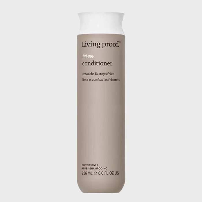 Beige bottle stands upright, labeled 
