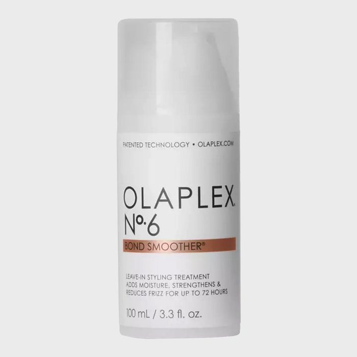 A bottle labeled â€œOLAPLEX No. 6â€ stands upright, promoting â€œBond Smootherâ€ for hair care, set against a plain background.