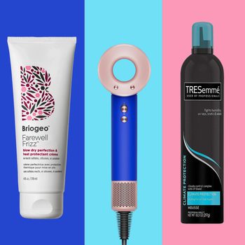 Hair products and tools in vibrant colors; a cream tube, futuristic blue hairdryer, and black mousse bottle against blue and pink background.