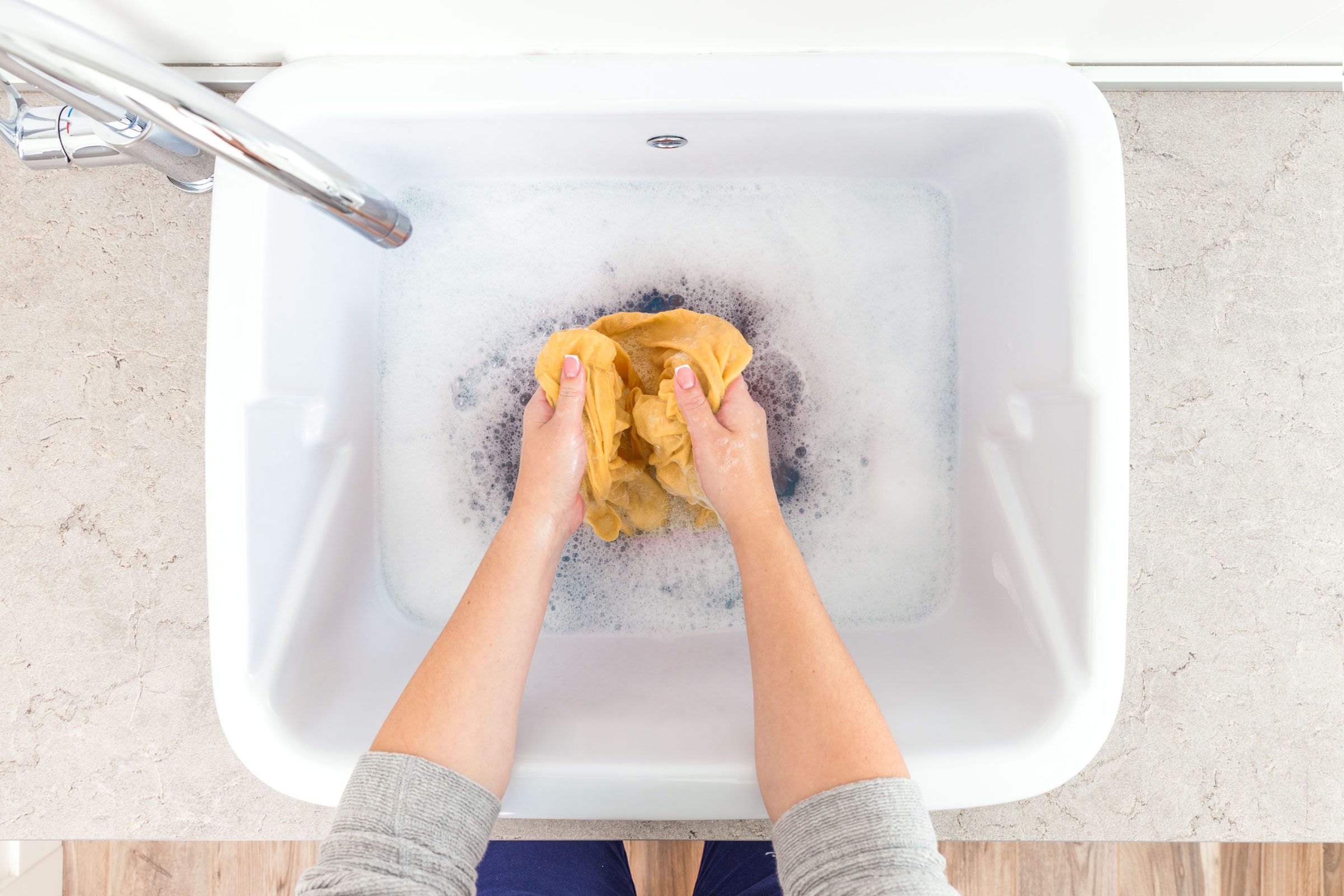 How to Hand-Wash Clothes the Right Way, According to Laundry Experts