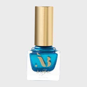 Blue nail polish bottle stands on a gray background. Golden cap and logo. Text reads: 