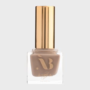 Nail polish bottle, standing upright; features a gold cap and taupe color, labeled 