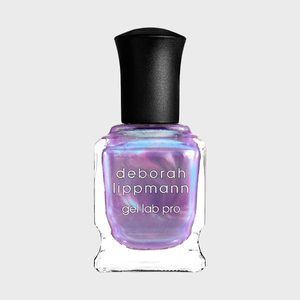 Nail polish bottle displaying iridescent purple shade, standing upright, labeled 
