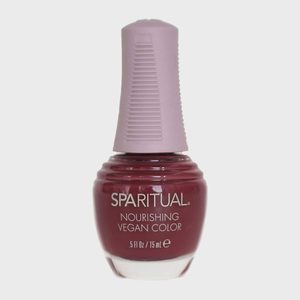 Nail polish bottle stands upright, labeled 