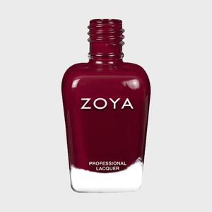 Bottle displays deep red nail polish with text 