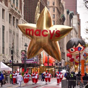 A large golden star balloon with 