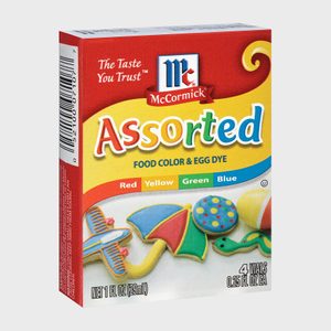 Box containing vibrant food dyes displayed. The label reads 