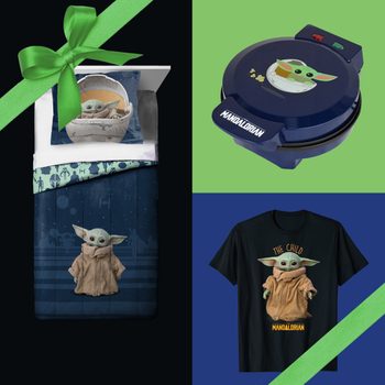 Bedding with character print lies neatly, waffle maker nearby, T-shirt featuring character below; all items have character theme, green ribbon diagonally crosses corners.