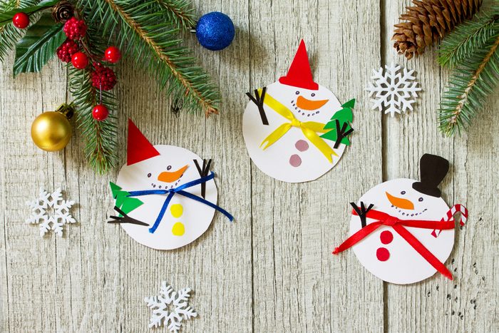 Christmas snowman merry gift on wooden table