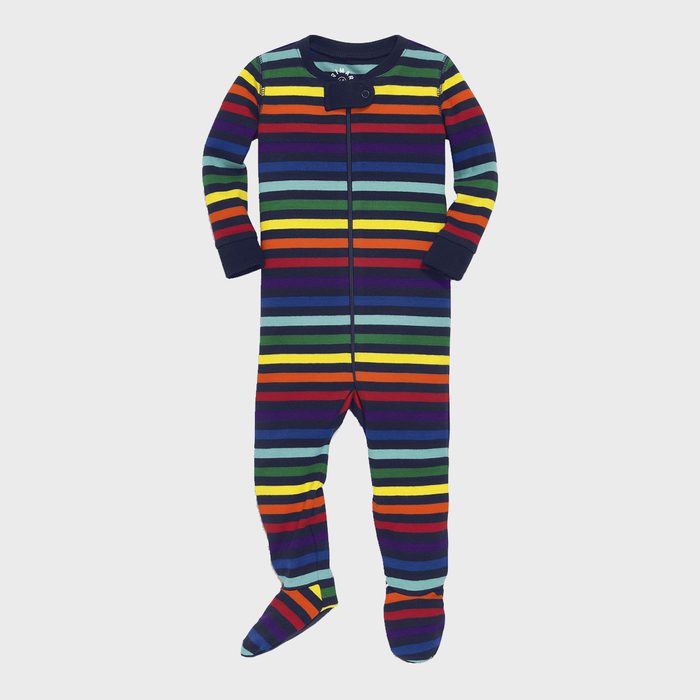 Striped footed onesie hangs, featuring vibrant horizontal rainbow colors against a plain background.