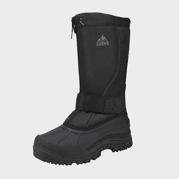 Boot stands upright; features adjustable strap and drawstring closure; set on a plain, light background. Visible logo: 