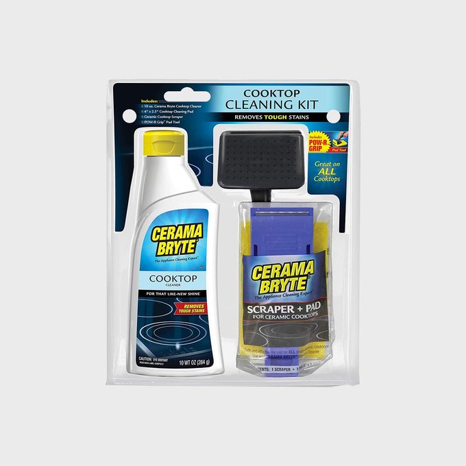 Cooktop cleaning kit with cleaner, scraper, and pad packaged together, labeled 